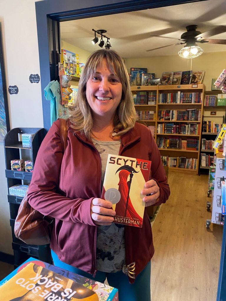 Librarian Holding Book